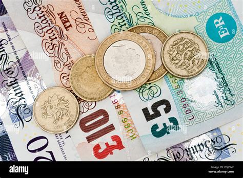 Money pounds coins cash sterling UK Stock Photo - Alamy