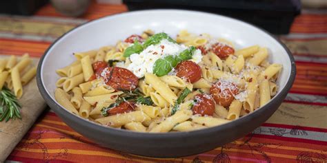 Lidia Basitanich finishes cooking penne pasta in spicy tomato sauce to infuse maximum flavor ...