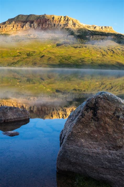 Sunrise on Lake with Bear To Butte in the Background, Montana Stock Image - Image of horizontal ...