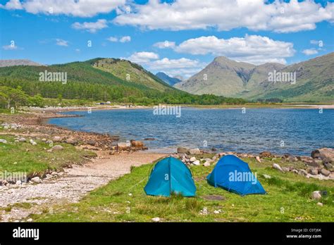 Campers on the shore of Loch Etive in Highland Scotland Stock Photo - Alamy