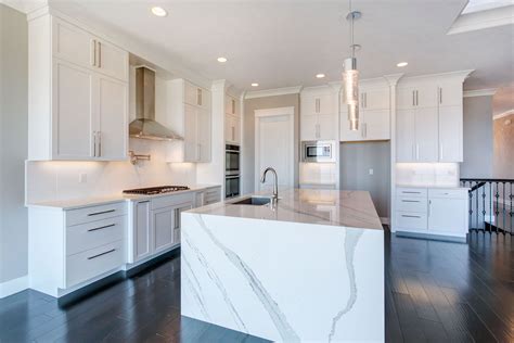 Photo Gallery - Prodigy Homes Inc. | Waterfall countertop, Waterfall island kitchen, Kitchen ...