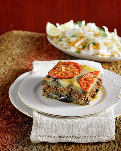 Moussaka prepared Asia Minor-style, with tomato and kasseri cheese, and ...