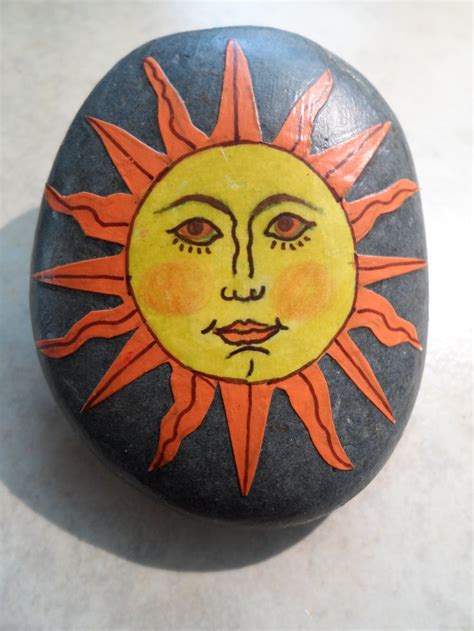 hand painted sun face on rock stone MBR | Rock painting art, Rock painting designs, Hand painted ...