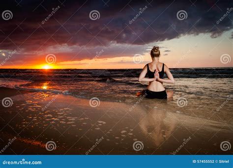 Meditation yoga on a beach stock photo. Image of padma - 57455552