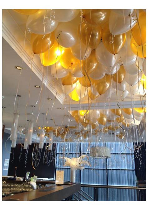 Loose helium filled ceiling balloons from Cardiff Balloons