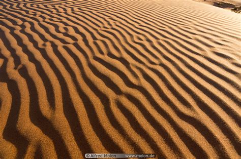 Sand ripple patterns photo. Sand patterns, Wahiba desert, Oman