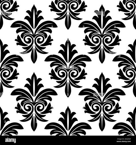 Bold foliate arabesque motif in black and white in a repeat seamless pattern suitable for damask ...