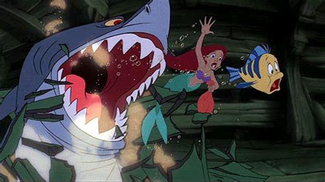 How do Ariel and Flounder escape the shark? - The Little Mermaid Trivia Quiz - Fanpop