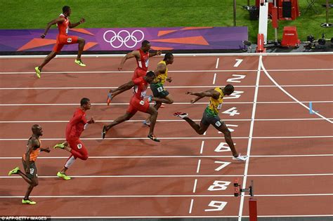 Outright winner: Usain Bolt streaks clear of the field to claim gold from lane seven in one of ...