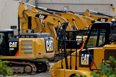 Caterpillar Posts $1.3 Billion Loss After Tax Reform | Peoria, IL Patch