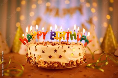 Happy birthday cake with candles. Stock Photo | Adobe Stock