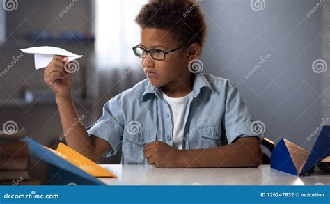 Afro-american Boy Playing with Paper Airplanes, Future Engineer ...