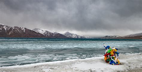 Pangong Lake in Winter with Prayer Flags