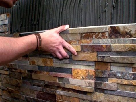 Slate tile wall installation | Hawk Haven