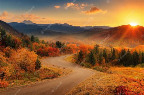 Premium Photo | Sunset in mountain landscape with highway