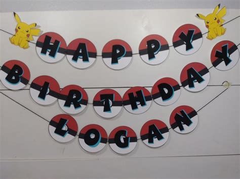 a birthday banner with pokemon characters on it