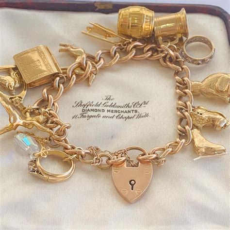 Superb heavy vintage 9ct gold charm bracelet with 14 gold charms ...