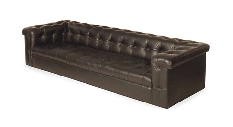 A MODERN BLACK LEATHER BUTTON-TUFTED SOFA | Christie's