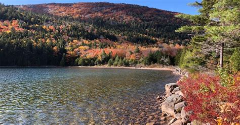 Jordan Pond in the fall : r/AutumnPorn