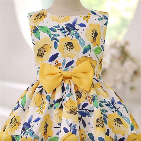 Shop Online Girls Yellow Bow Applique Sleeveless Party Dress at ₹1379