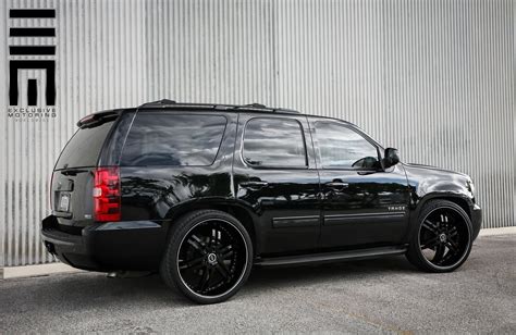 Black Tahoe Rolling on 24 Inch Rims by Exclusive Motoring Black Tahoe ...