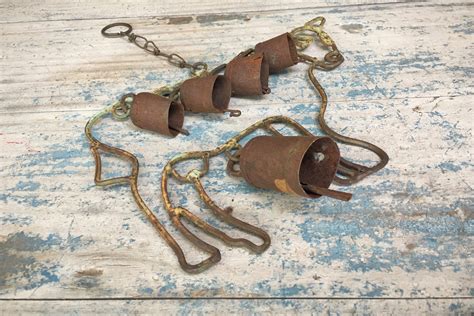 Vintage cow wind chime rusty metal cow bells, metal windchimes, patio ...