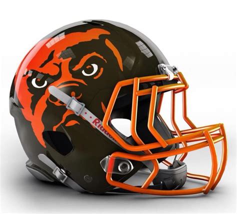 an orange and black football helmet with a gorilla face on it's side is shown