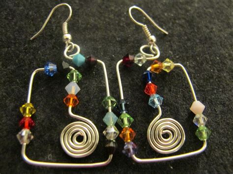 Naomi's Designs: Handmade Wire Jewelry: Funky silver wire wrapped earrings with Swarovski crystals