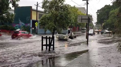 Sydney floods: One dead as month's worth of rain falls in single ...