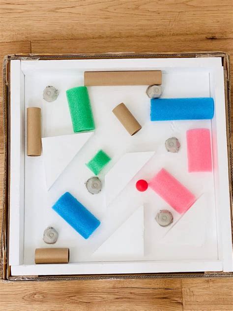 Giant Cardboard Ball Maze - Fun recycled STEM project for kids