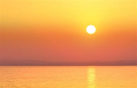 Free Stock Photo of Hazy Sunset Over a Calm Sea - Summer Holidays | Download Free Images and ...