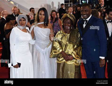 May 20th, 2022. Cannes, France. Sabrina Elba, her mother, Idris Elba and his mother Eve Elba ...