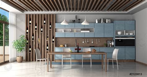 Blue and wooden kitchen with dining table - stock photo 2123813 ...