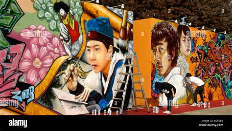 Artists painting graffiti at festival, Jinju Fortress, Seoul, South Korea Stock Photo - Alamy