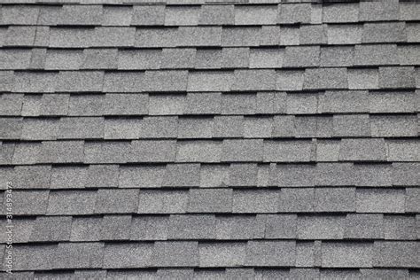 Roof shingles background and texture. grey and black asphalt tile of ...