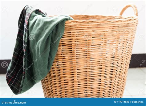 Dirty Clothes in a Laundry Basket Stock Image - Image of conceptual, clothing: 117714833