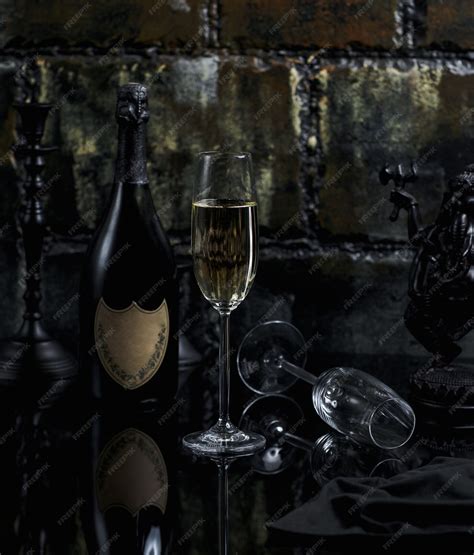 Free Photo | A glass of prosecco with bottle around