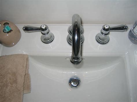 A view of the sink hardware | So I replaced the handles with… | Flickr