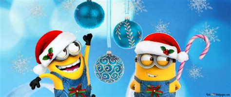 Both minions enjoying Christmas day 2K wallpaper download