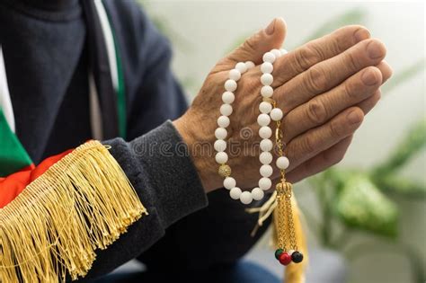 Praying Hands of an Old Man Holding Rosary Beads. Stock Photo - Image ...