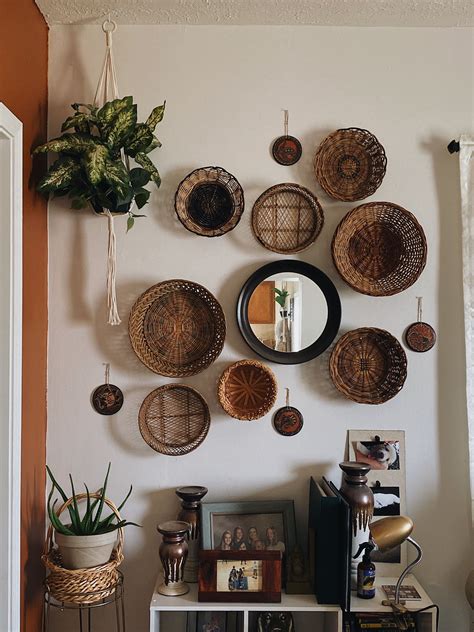Boho Wicker Basket Wall with Hanging Plants | Basket wall decor, Baskets on wall, Wicker basket ...