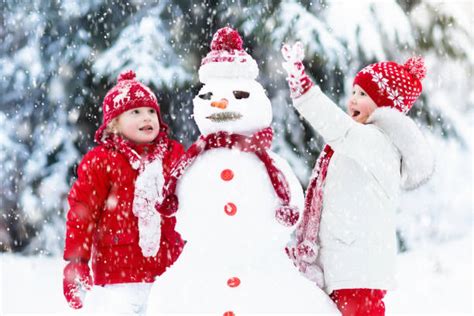 Best Building A Snowman Stock Photos, Pictures & Royalty-Free Images - iStock