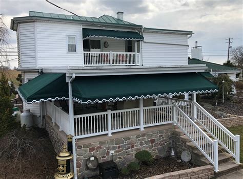 Porch and window awnings all around a home | Kreider's Canvas Service, Inc.