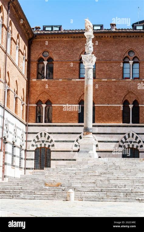 Old medieval architecture in the streets of Siena in Italy Stock Photo - Alamy