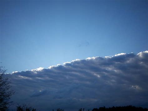 Partly Cloudy Sky Photograph by Scarlett Stephenson