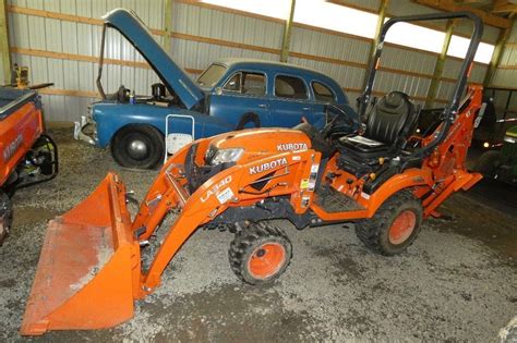 Kubota BX23S Tractor w/ LA340 Loader & Backhoe | Live and Online Auctions on HiBid.com