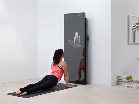 FORME Studio LIFT connected fitness mirror has a built-in weight ...