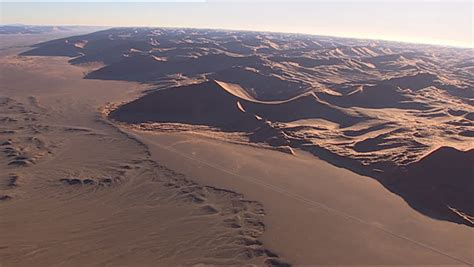 Aerial Of Desert Sand Dunes Stock Footage Video 3559928 - Shutterstock