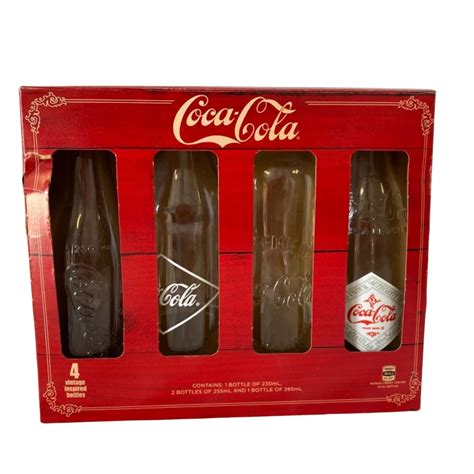 4 Vintage Coca Cola inspired Bottles(s)