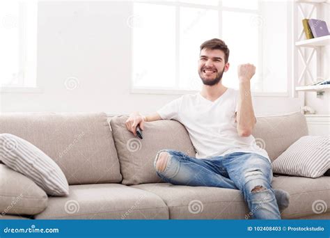 Man Watching Sports on Tv and Supporting Team Stock Image - Image of home, couch: 102408403